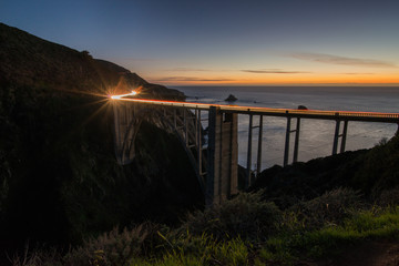 Bixby Creek Bridge, Big Sur During the Blue Hour After Sunset with Long Exposure of Car Light Trails