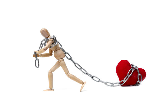 Wood Figure Mannequin using a chain to pull a big red heart