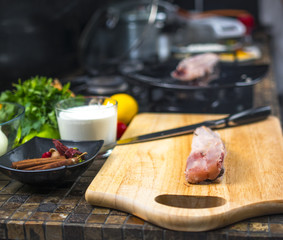 fish before cooking is on the board