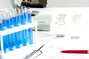 Laboratory, chemistry and science concept on white background