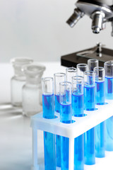 Laboratory, chemistry and science concept on white background