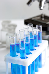 Laboratory, chemistry and science concept on white background