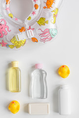 baby accessories for bath with duck on white background