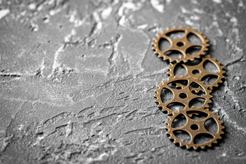 concept hour metal gears on dark background top view