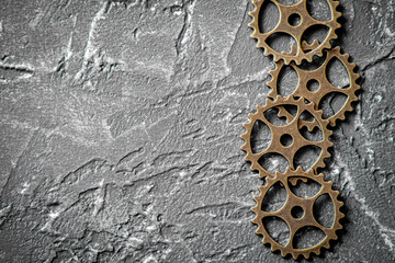 concept hour metal gears on dark background top view