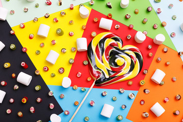 Obraz premium lollipops, candy pattern, top view flat lay on colorful backgrou