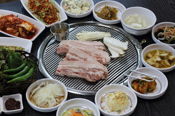 Raw pork grill on hot coals. korean style BBQ,samgyupsal