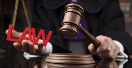 Justice and law concept. Male judge in a courtroom