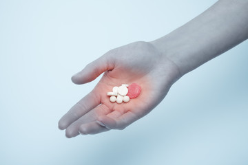Hand with pills