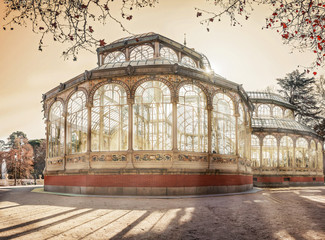 Crystal Palace building under evening sunlight at Retiro Park in the city of Madrid, Spain