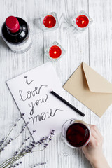 concept Valentine's Day love letter wooden background top view