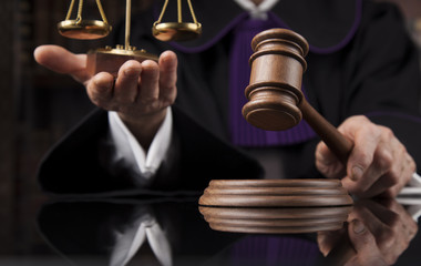 Justice and law concept. Male judge in a courtroom