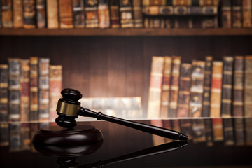 law theme, mallet of the judge, justice scale, books, wooden des
