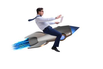 Businessman flying on rocket in business concept