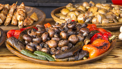 Food banner of meat cut into strips Pan with goulash stroganoff meal on rustic wooden plate