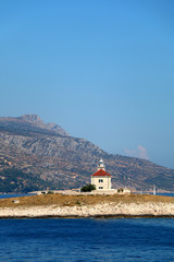 Picturesque lighthouse on a small island in the Adriatic Sea. Near town Hvar, island Hvar, Croatia.
