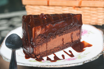 Delicious chocolate cakes on dish
