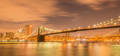 Fototapeta na wymiar Night view of Manhattan and Brooklyn bridge