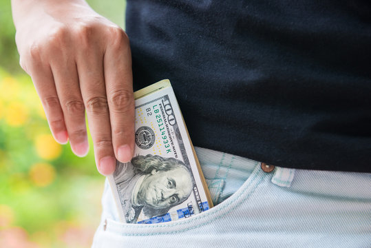 picked American dollars out of pocket