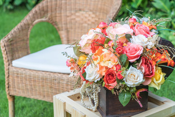 empty chair with bouquet flower decoration