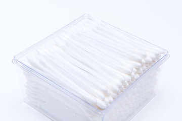 Cotton buds in plastic box isolated on white background