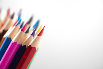 Color pencils with depth and field isolated on white background