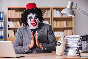 Clown businessman working in the office