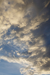 Fototapeta na wymiar Cumulus clouds against a blue sky. Overcast. Anticyclone. Weather forecast.