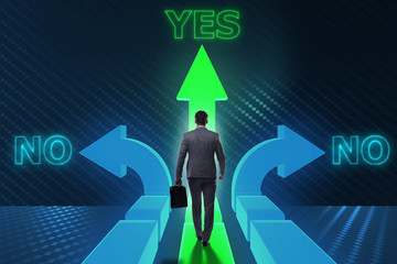 Fototapeta premium Businessman in difficult choice concept