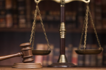 Law and justice concept, Brown wooden background