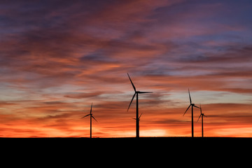 Wind Turbines spinning into the night