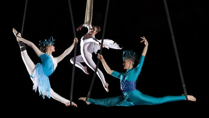 Young couple circus air gymnast