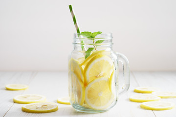 lemonade in jar with green straw