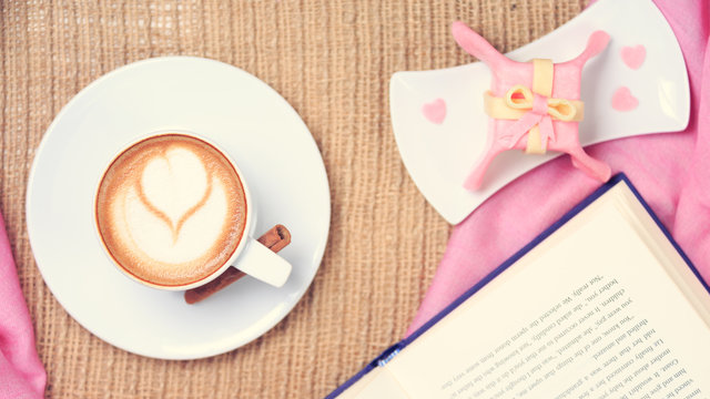 Coffee with pink scarf. Valentines concept. Rustic style. Flat l