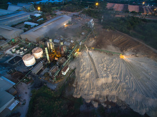 aerial view from drone sugar factory at night.