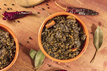 Lentil stew, shot from above, with bay leaves