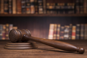 law theme, mallet of the judge, justice scale, books, wooden des