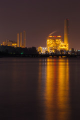 electrical power plant near sea coat at night, Rayong, Thailand