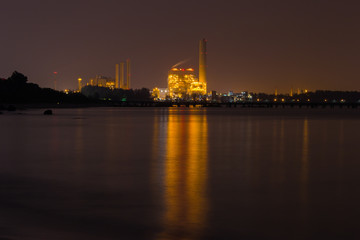 electrical power plant near sea coat at night, Rayong, Thailand
