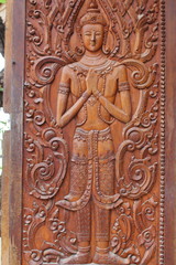 Fototapeta na wymiar Carved wooden temple in a public place.
