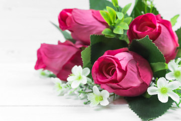 Roses on wooden board, Valentines Day background, wedding day.