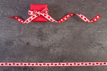 Wrapped gift with ribbon for Valentines Day, copy space for text