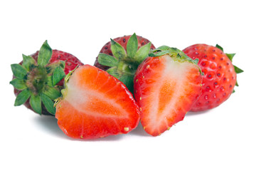 Group of of red ripe strawberry fruit isolated on white backgrou