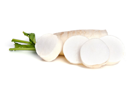 Fresh white radish with slices isolated on white background