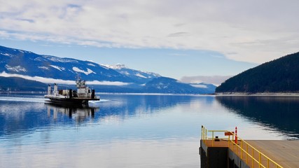 Ferry boat on blue lake. Upper Arrow lake. Columbia River.  Selkirk and Monashee Mountains.  Keenleyside Dam. Castlegar. Revelstoke. British Columbia. Canada. © aquamarine4