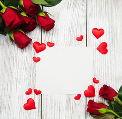 Red roses and greeting card