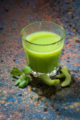 glass of juice of celery and greens,  top view