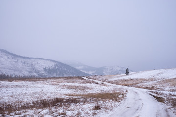 Snow road with views of the mountains