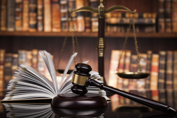 Law books, mallet of the judge, Courtroom background