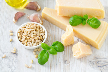 pesto ingredients on wooden surface